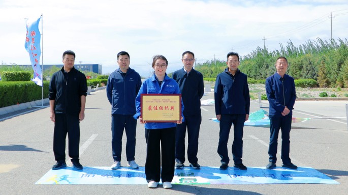 新能源公司組織職工參加武威涼州工業(yè)園區(qū)“匠心向黨 步履不?！甭毠そ〔阶呋顒?dòng)